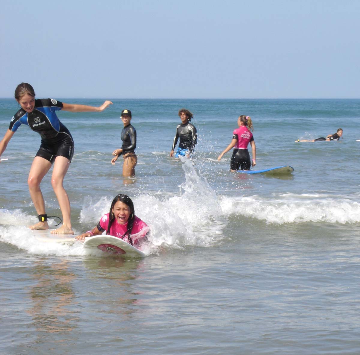 Group of surfers on a beach in Saint-Pierre d'Oléron