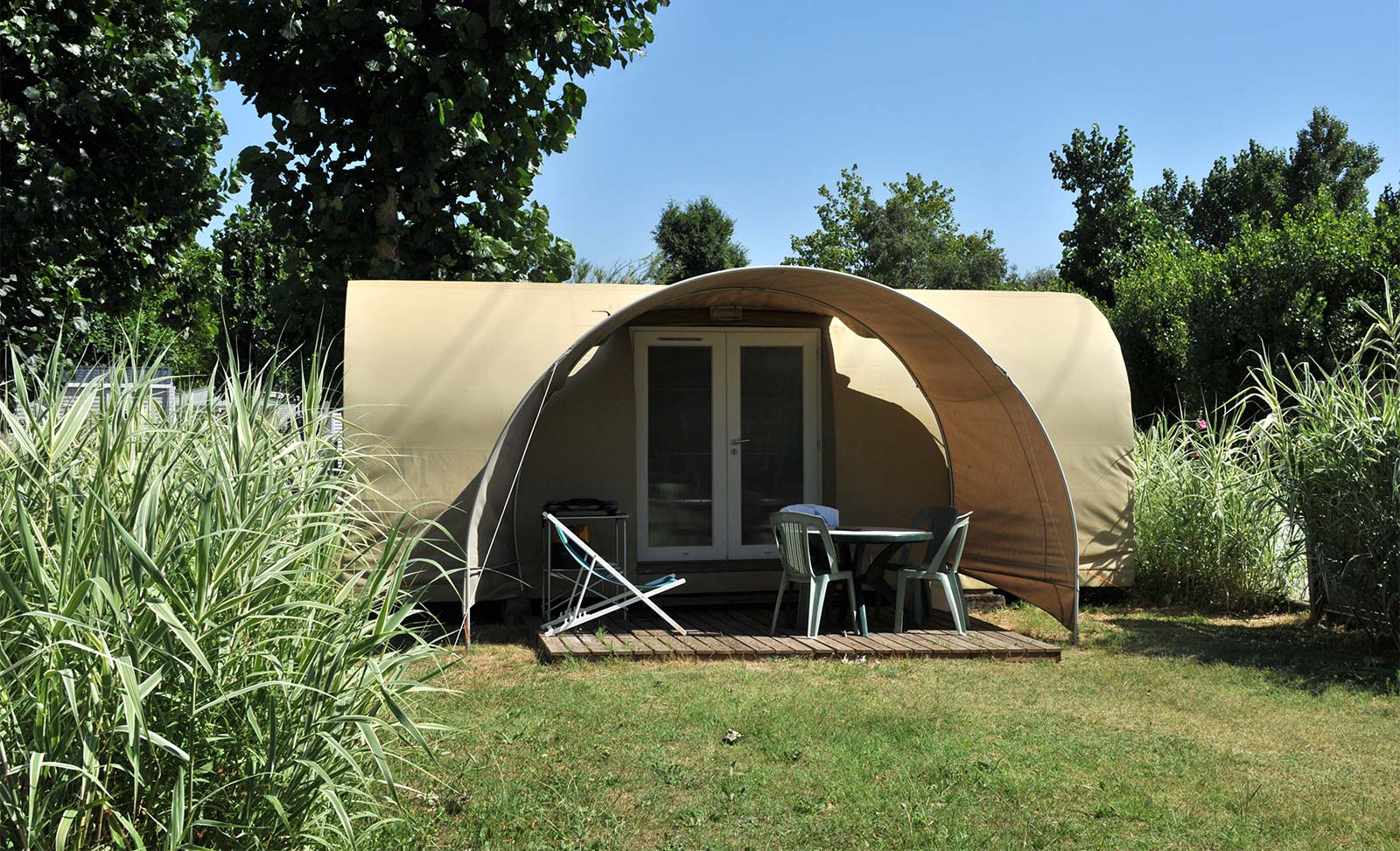 Cocosweet, wood and canvas tent in the campsite park in Oléron